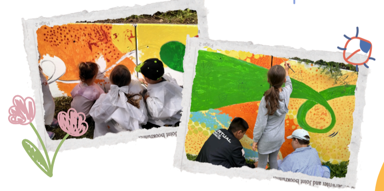Immagine: Immagine dei bambini che dipingono il murales